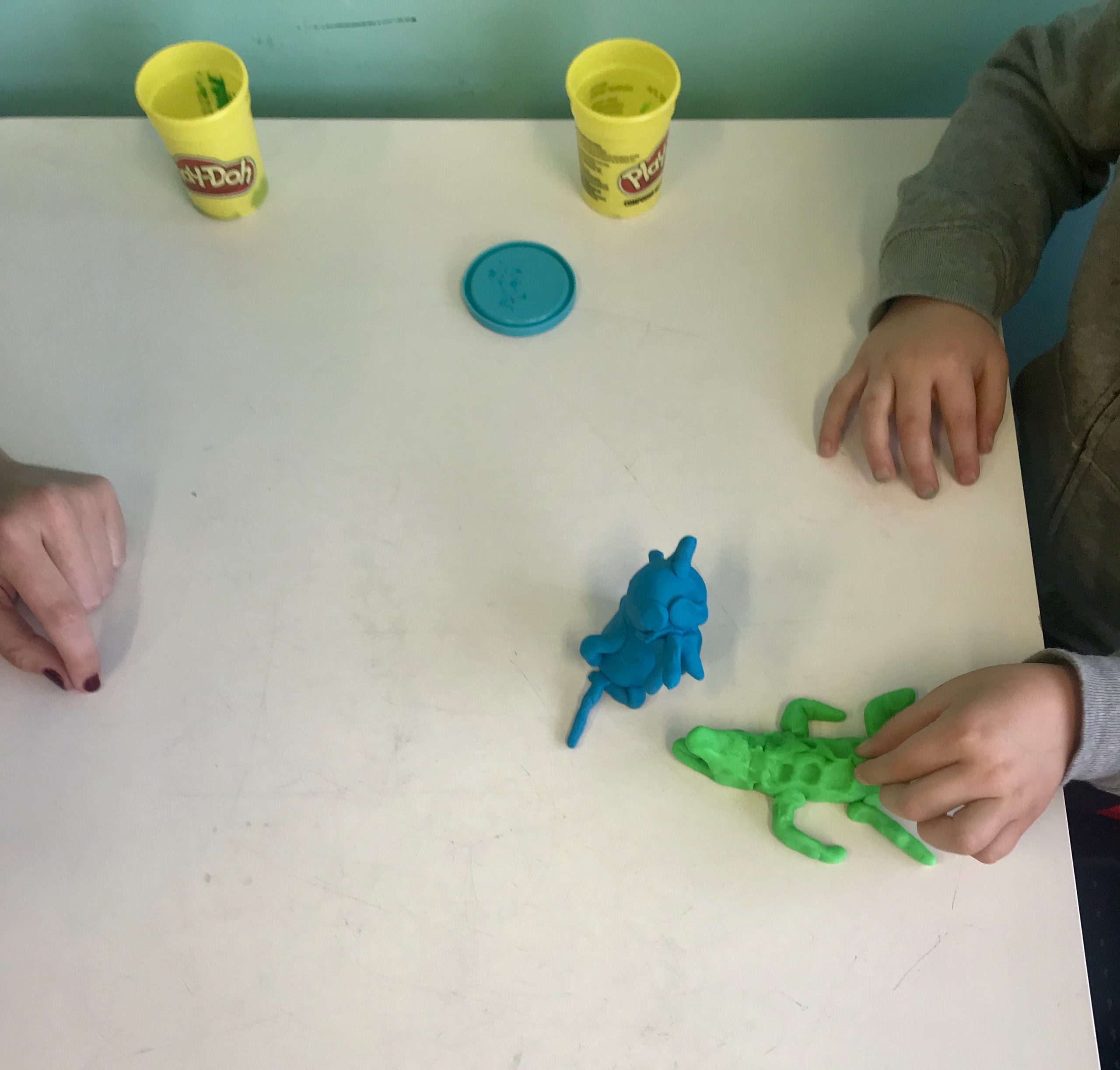 Child working on fine motor skills with an occupational therapist in our Bondi Junction and Mascot occupational therapy clinics