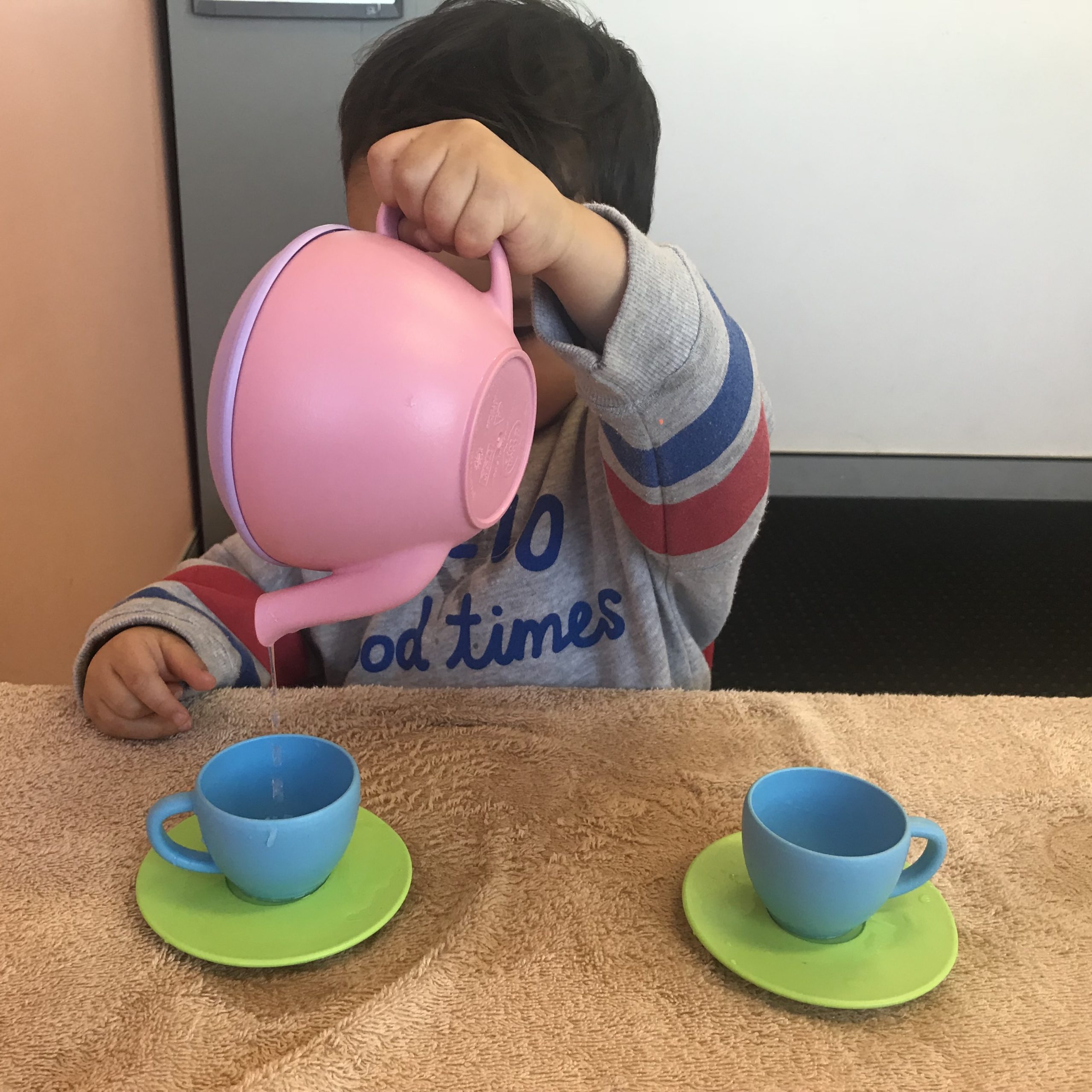 Child with autism having lots of fun in Sydney ESDM clinic