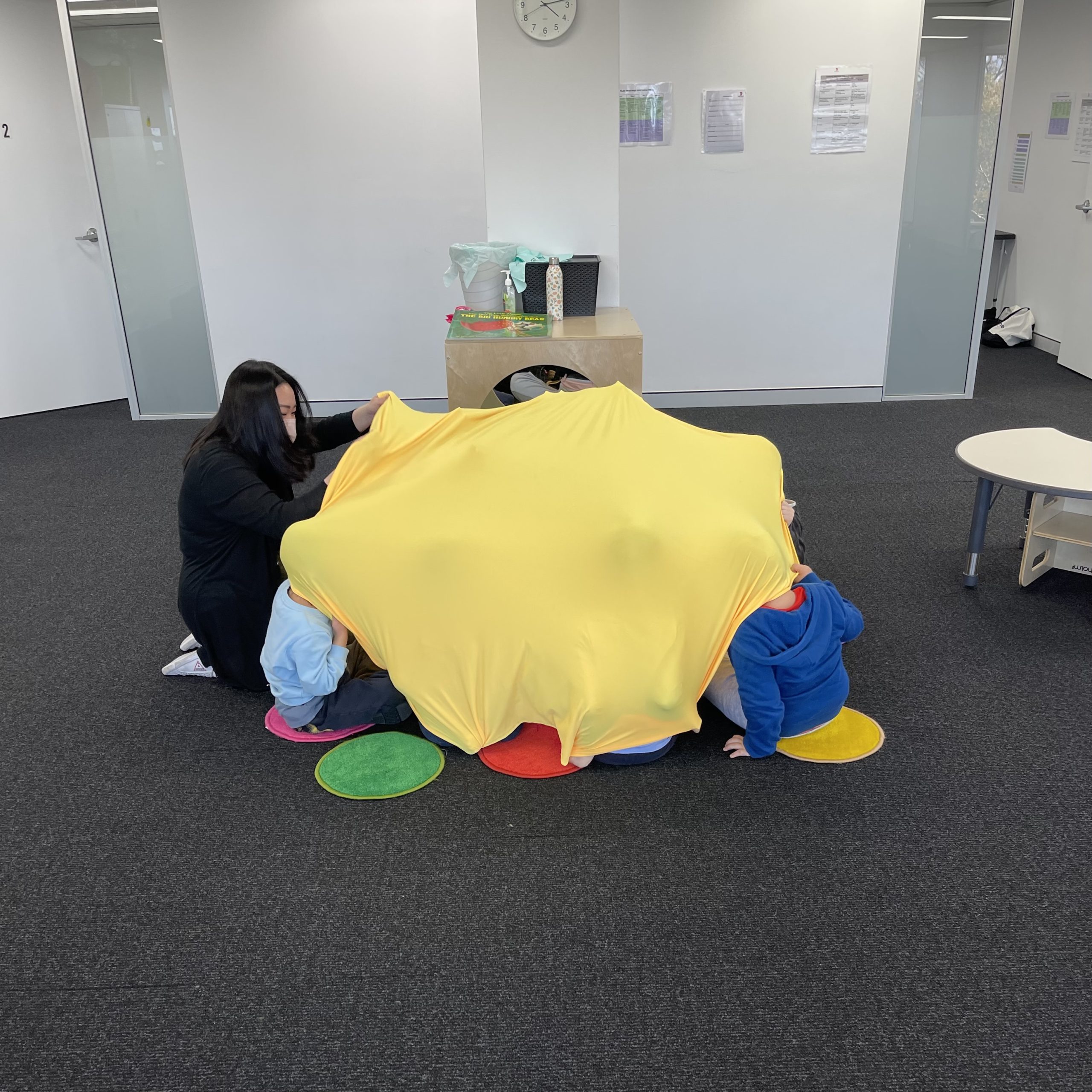 Group of children doing intensive group social skills in Early Start Denver Model ESDM intervention for young children with autism in Sydney.