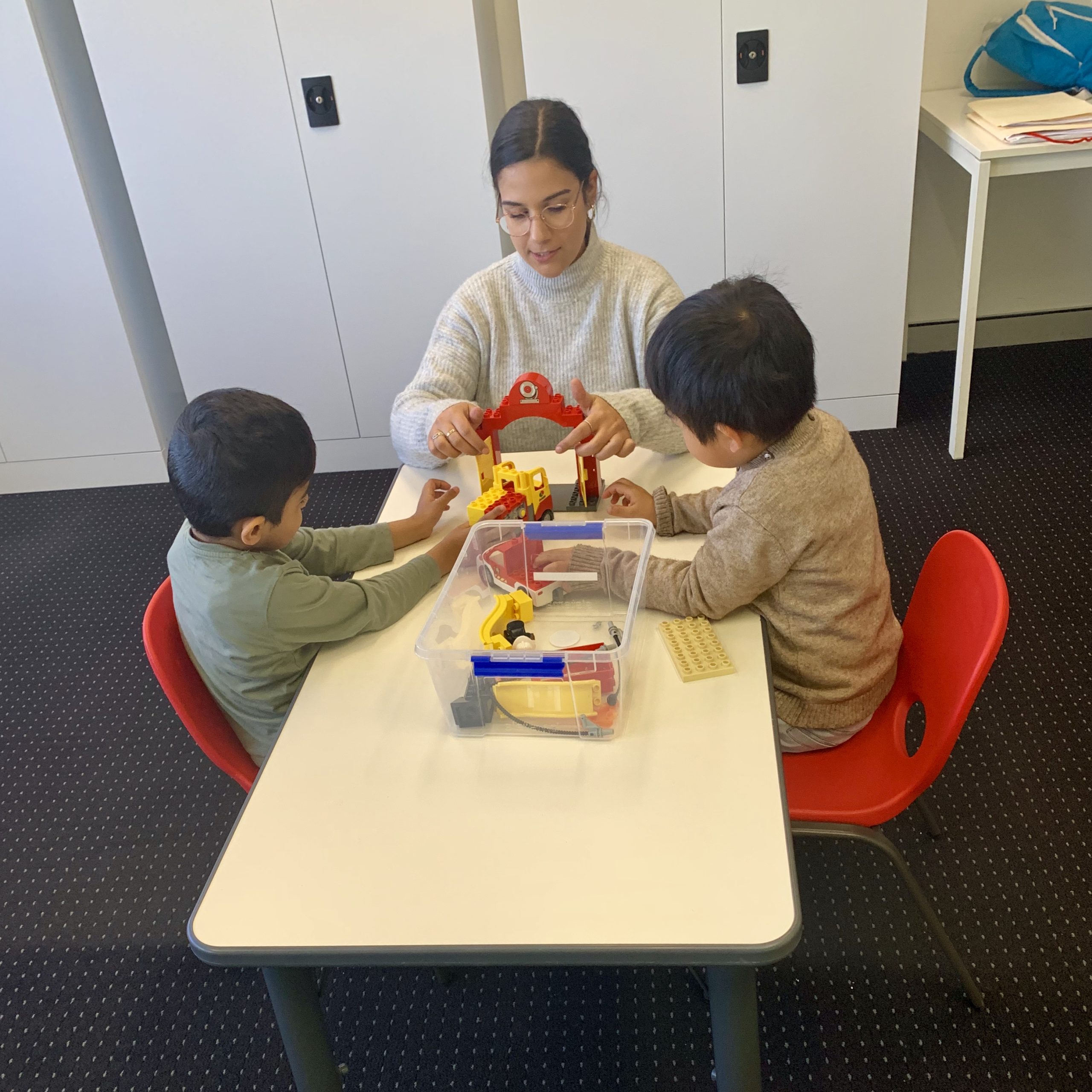 Two boys with autism and a Certified ESDM Therapist doing the Early Start Denver Model ESDM early intervention in Sydney